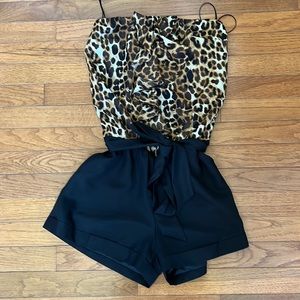 Strapless black and leopard romper with pockets.